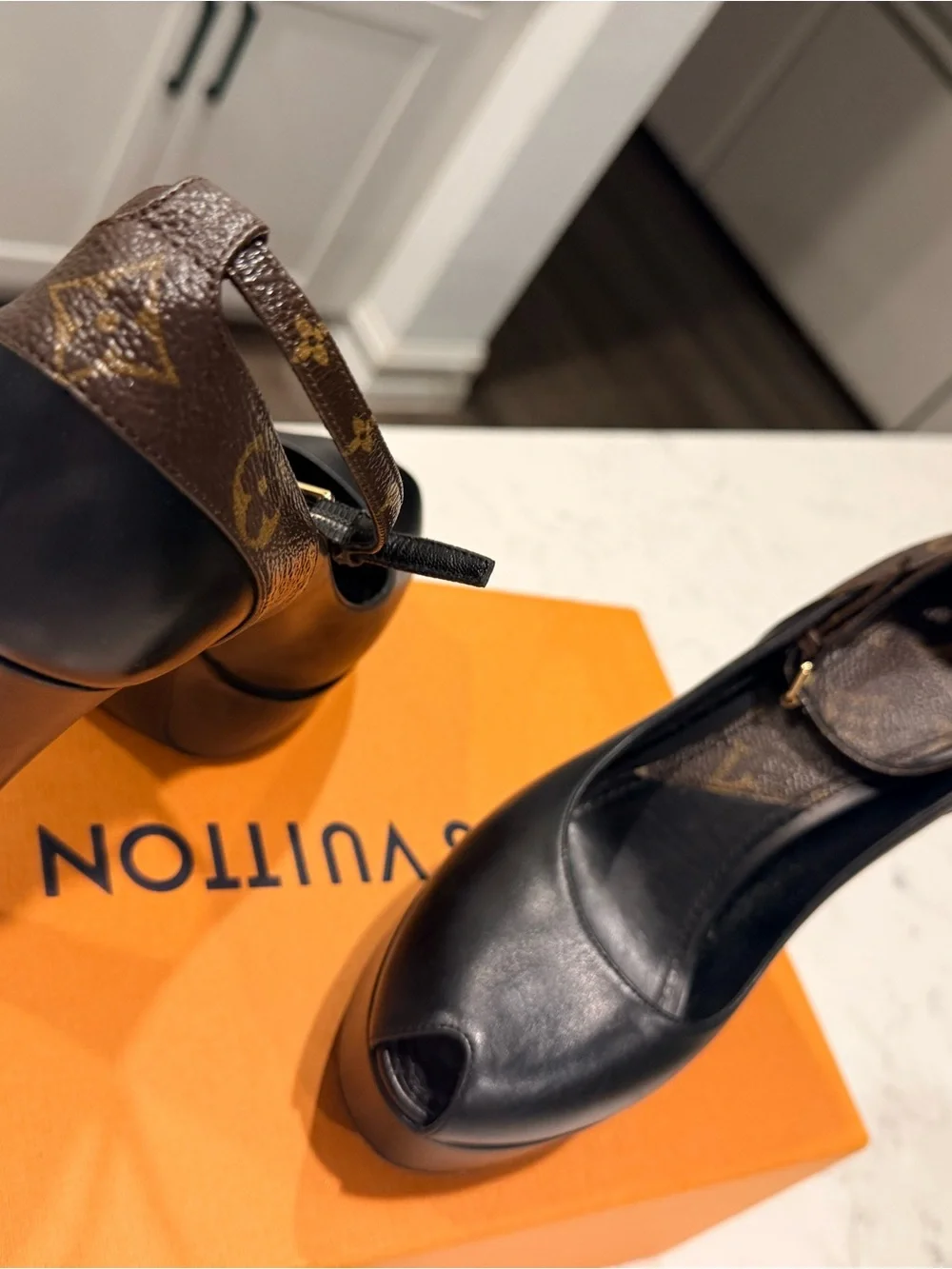 Louis Vuitton Black Leather Platform Pumps with Monogram Accent